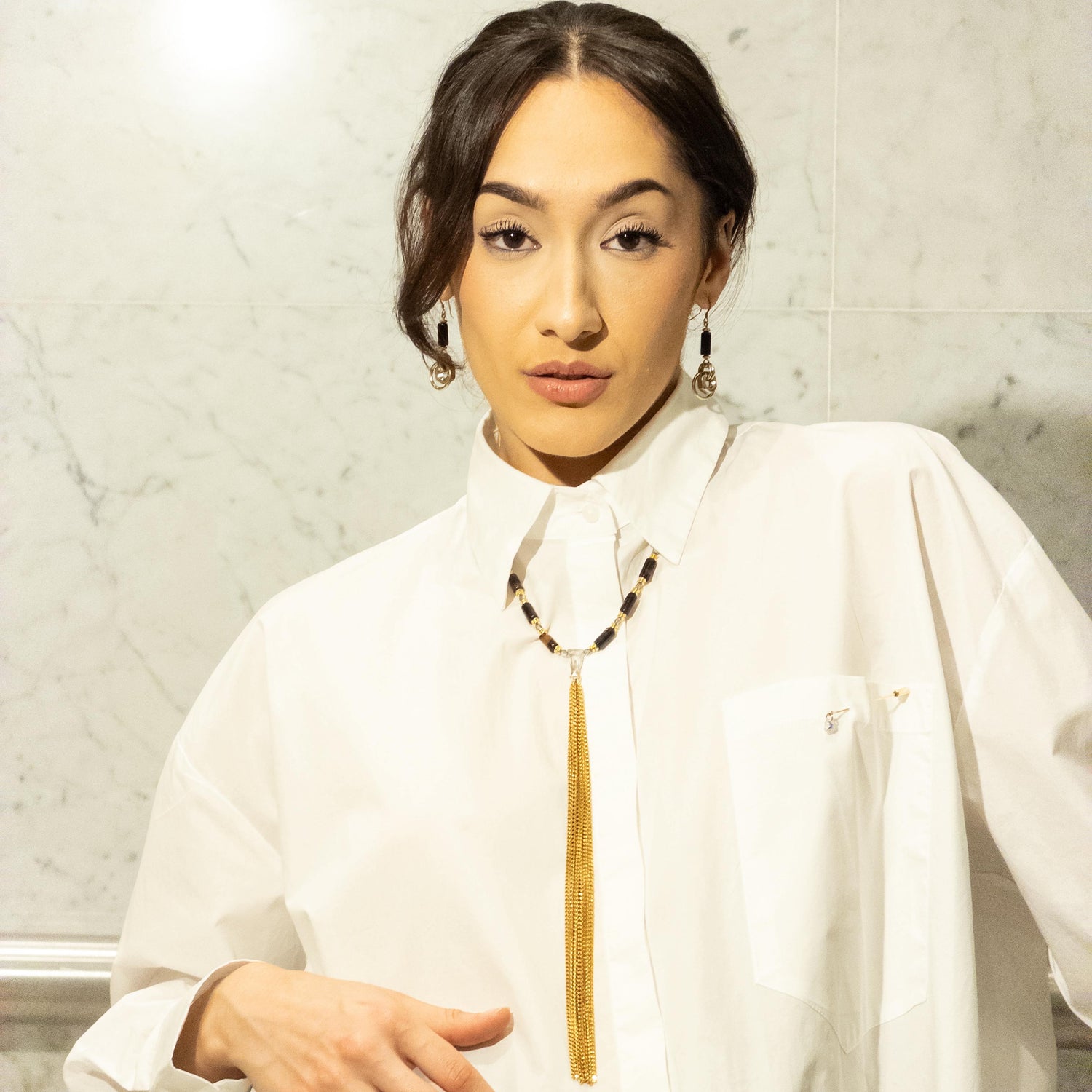 MONOXIDE jewellery styled with an architectural white shirt